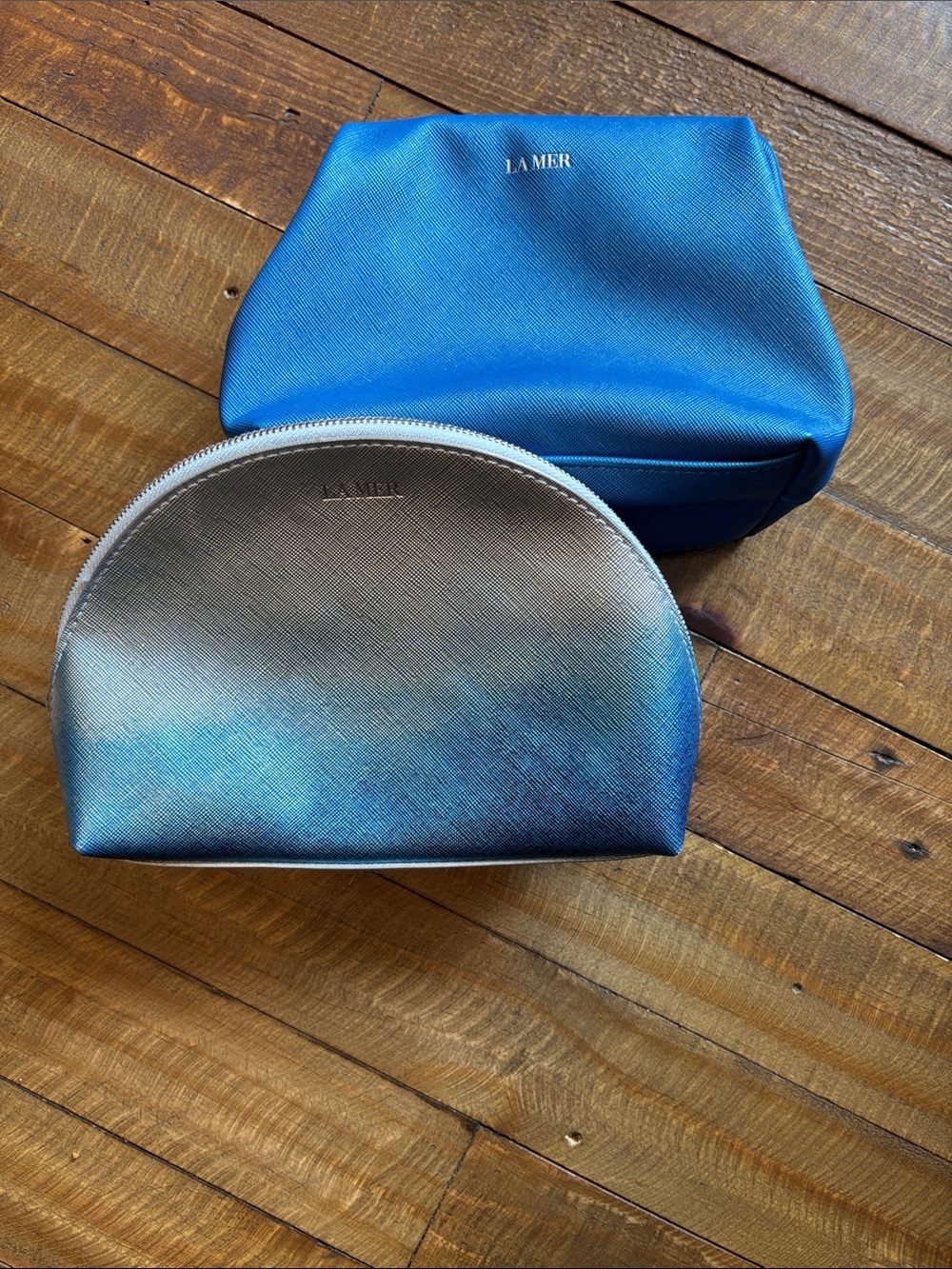 La Mer Blue and Shimmering Silver Cosmetic Pouches Set